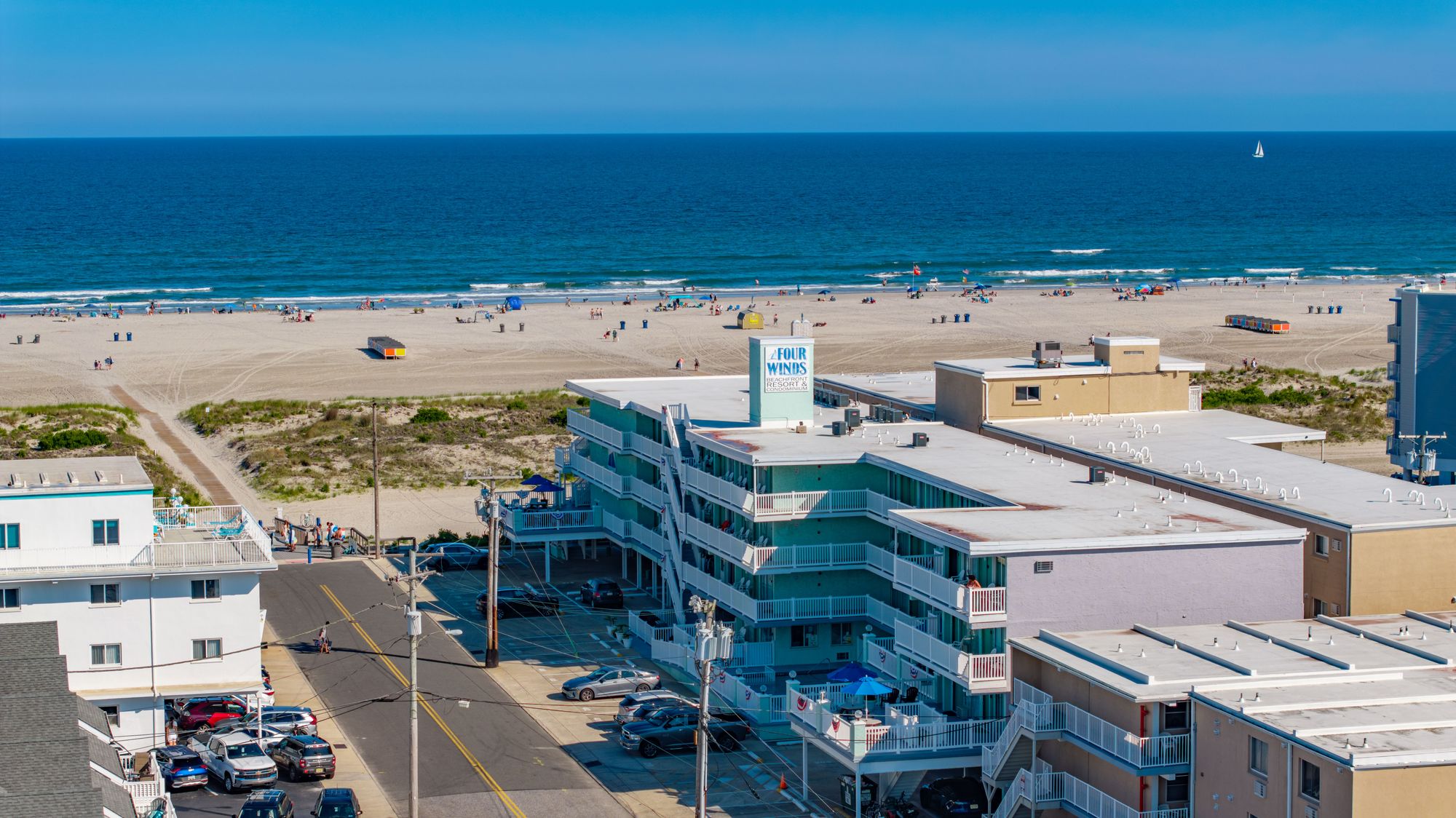 Aerial view of Four Winds on the Beach with the Wildwood Crest beach and ocean just beyond