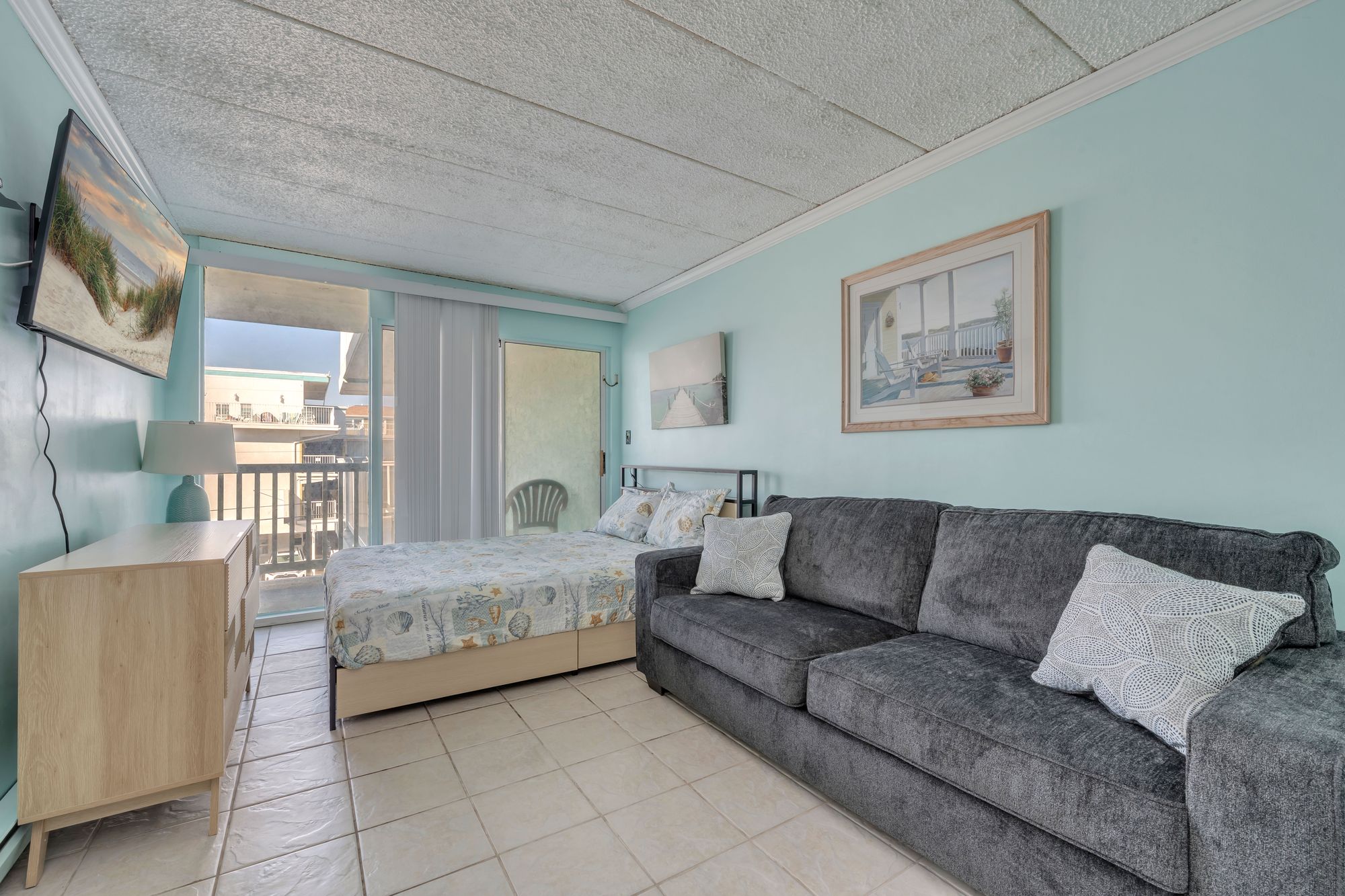 Bedroom with a queen bed and the queen sleeper sofa