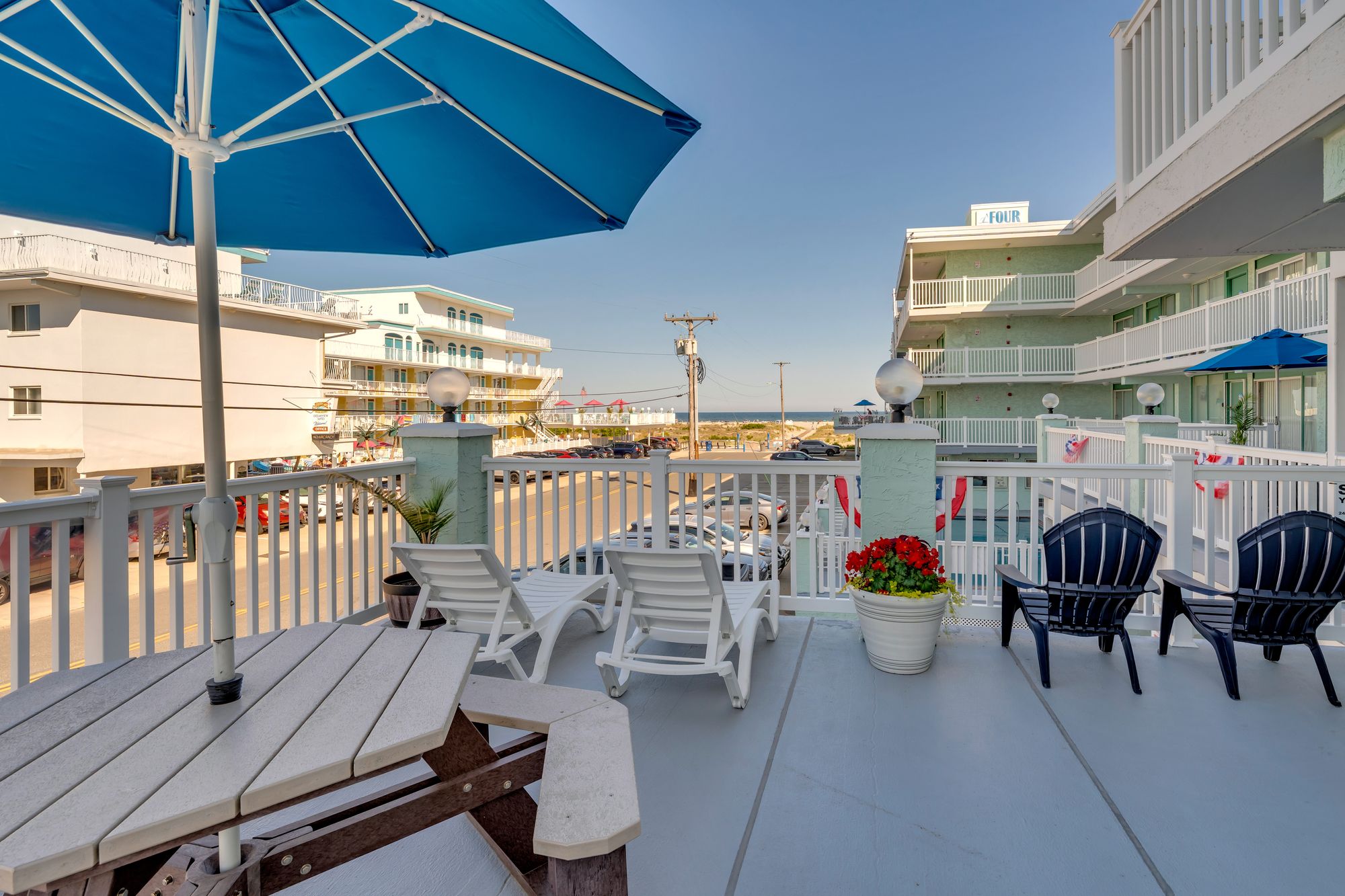 Sun deck seating with umbrellas and chairs